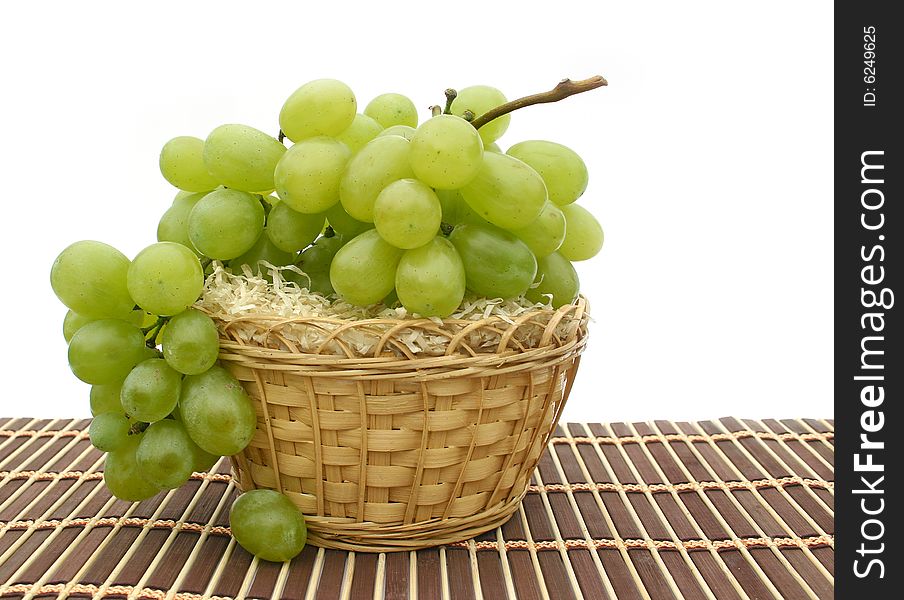 Grapes in a basket on a napkin