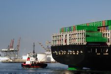 Tugboat And Back Of Container Ship Royalty Free Stock Image Tugboat And Back Of Container Ship Royalty Free Stock Image
