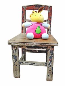 Rabbit Doll And Wooden Stool Royalty Free Stock Photos