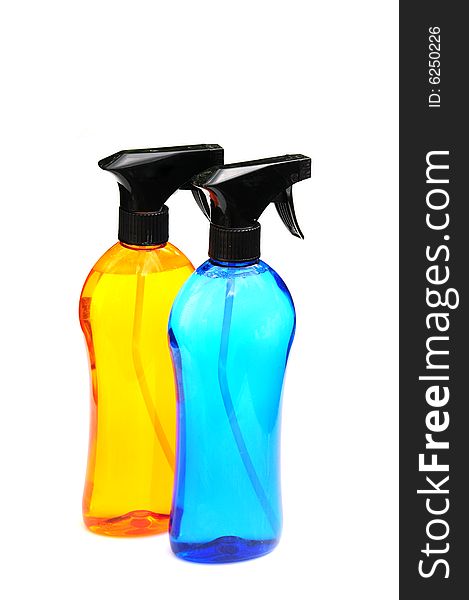 Two bottles of cleaning fluid isolated on white