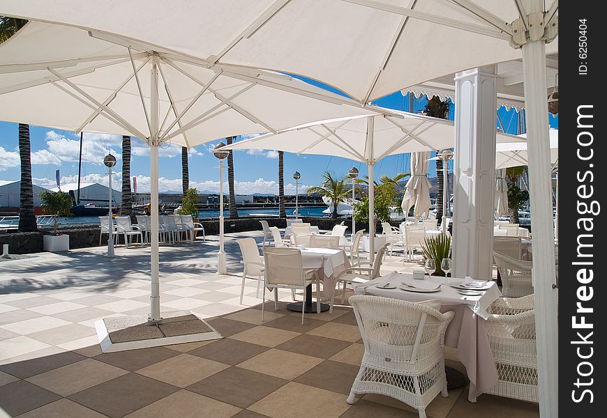 Terrace set for al fresco dining in the sunn