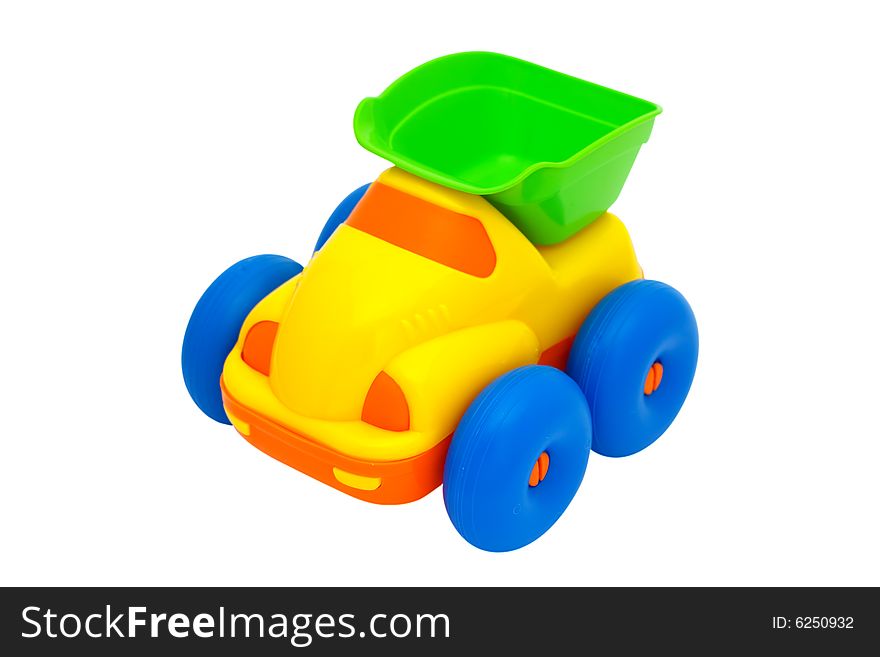 Toy Dump Truck. This car - a symbol of transportation of cargoes.