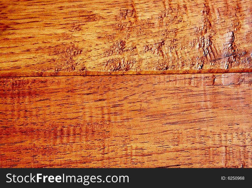 Hickory hardwood floor boards with a distressed texture and rustic appearance.