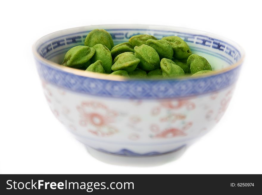 It shows a bowl of Wasabi Nuts. A japanese Trend food.