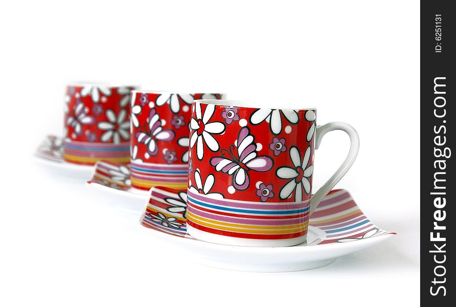 Bright cups of black coffee isolated on the white