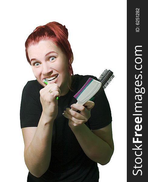 Funny woman with combs on white background.