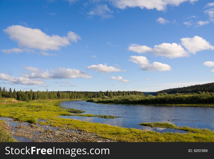 Landscape with river and clouds