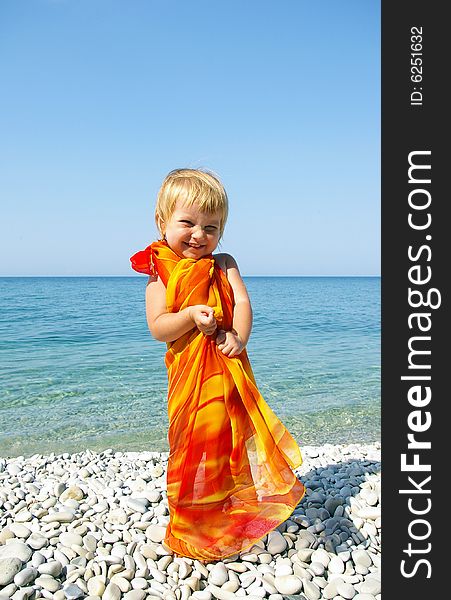 Cute little girl on seacoast