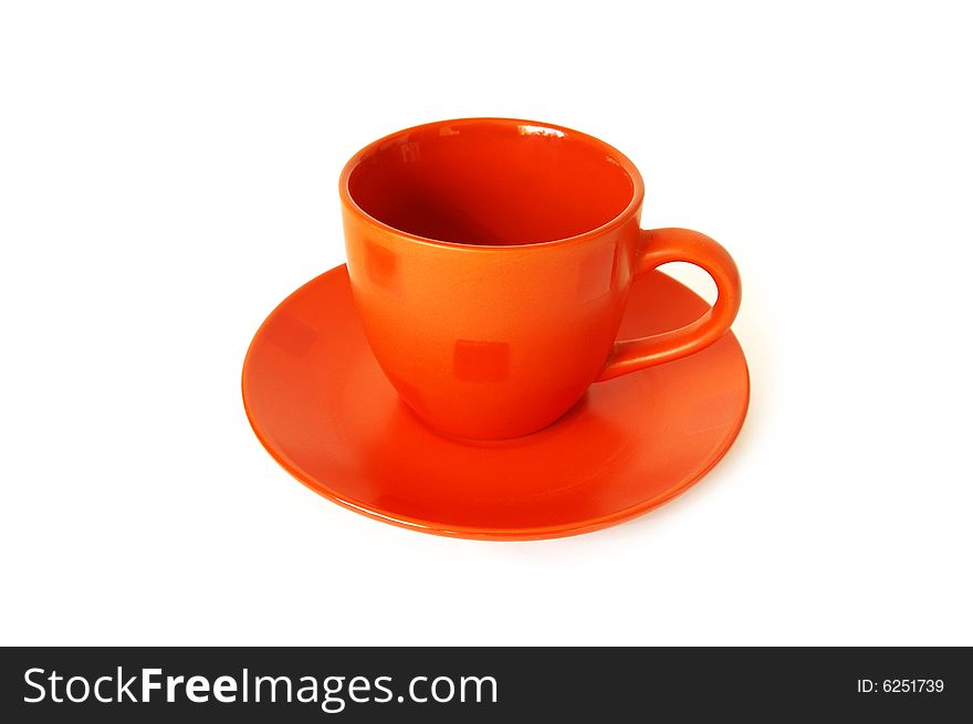 Red ceramic cup of coffee isolated on a white background