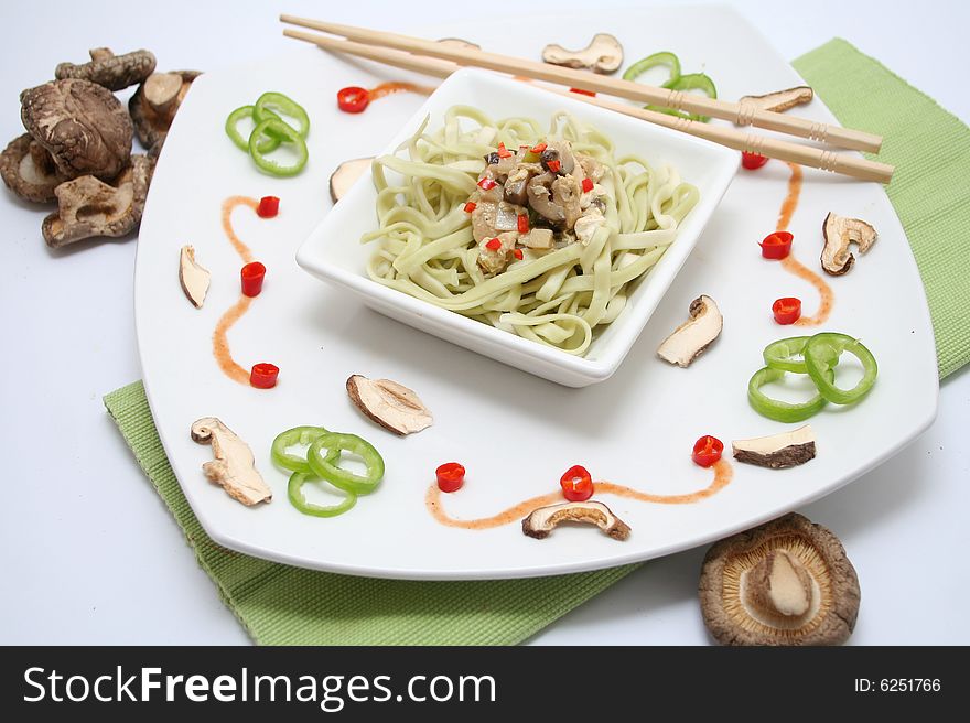 Fresh pasta with vegetables and mushrooms