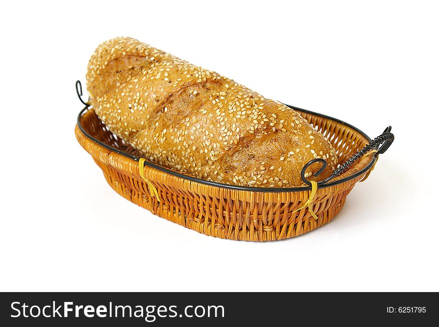 Fresh roll in a basket isolated on a white background. Fresh roll in a basket isolated on a white background