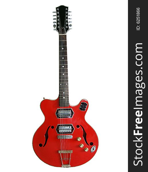 A red acoustic and electric guitar with sound holes. A red acoustic and electric guitar with sound holes