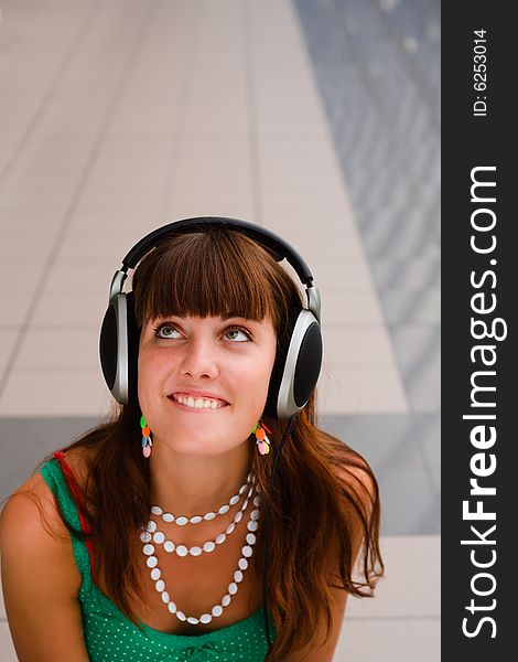 Young Smiling Girl In Headphones