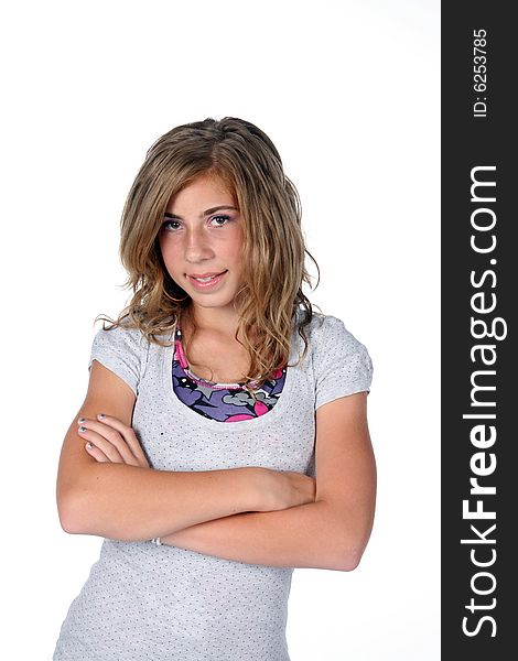 Young girl with arms crossed and layered shirts