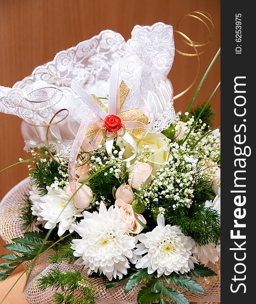White garter on the wedding bouquet