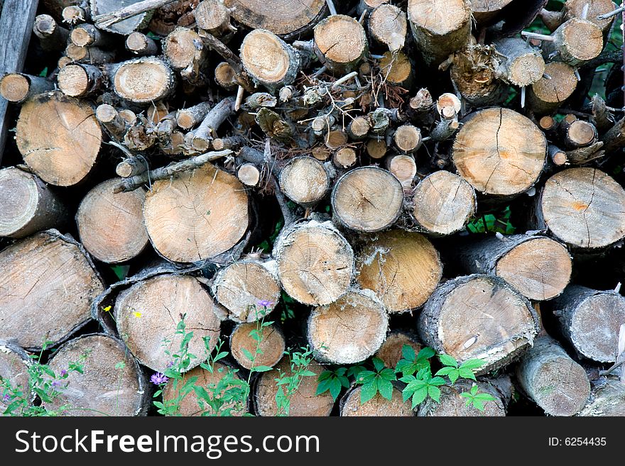 Pile of firewood in horizontal orientation. Pile of firewood in horizontal orientation