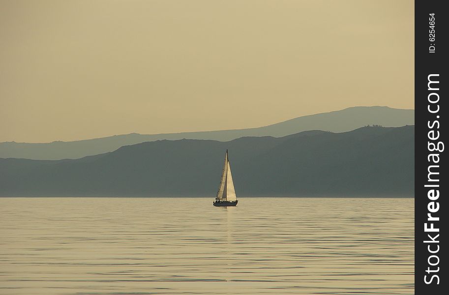 Sunset on the Baikal lake near island Olkhon