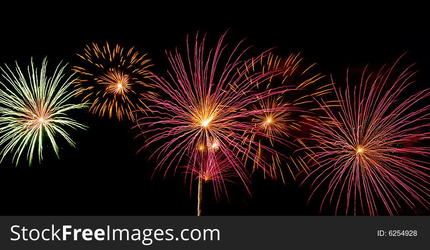Bright colored fireworks on black background. Bright colored fireworks on black background