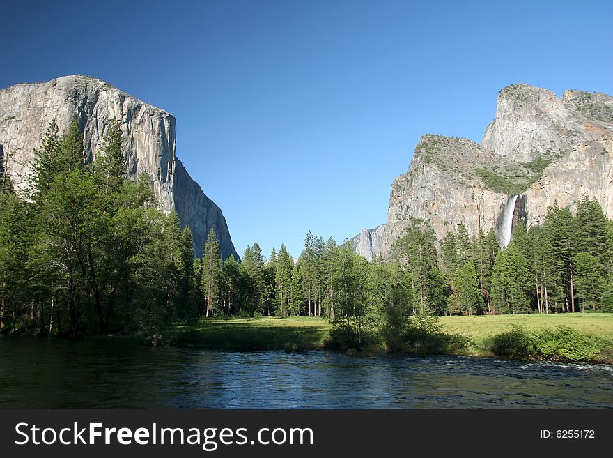 Famous natural landmark destination El Capitan, one of the magnificent mountains in Yosemite. Yosemite national park. California. USA. Famous natural landmark destination El Capitan, one of the magnificent mountains in Yosemite. Yosemite national park. California. USA