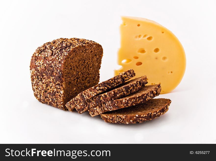 Appetizing bread and cheese on white background