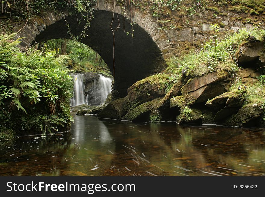 Scenic small bridge with beautiful stream underneath in county Kerry, Ireland. Scenic small bridge with beautiful stream underneath in county Kerry, Ireland