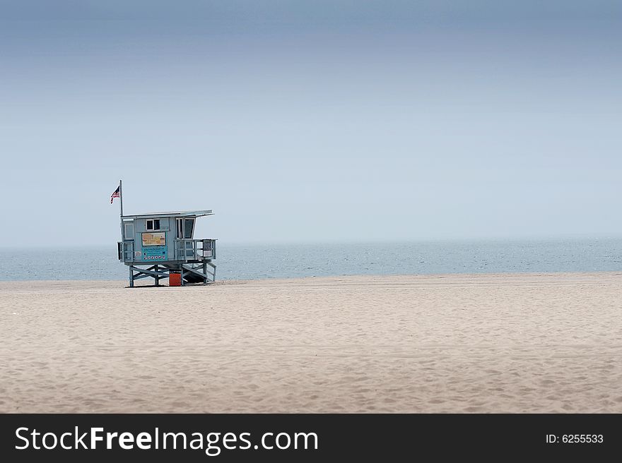 Lifeguard hut on the beach isolated on blue sky. Lifeguard hut on the beach isolated on blue sky