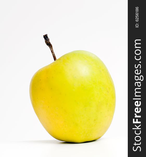 Yellow apple studio shot at white background