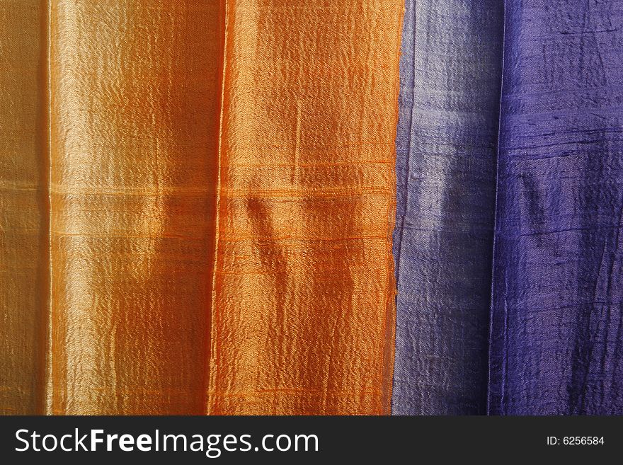 A simple  background with many color silk fabric. A simple  background with many color silk fabric