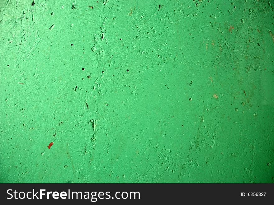Green old paint texture wall with scratches. Green old paint texture wall with scratches