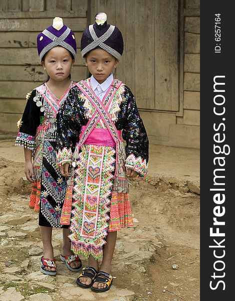 Laos Hmong girl in traditional clothes in the surroundings of Luang Prabang