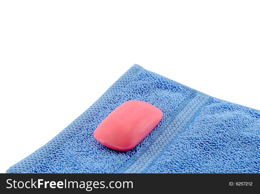 Soap and towel. It is isolated, on a white background. Cleanliness health pledge