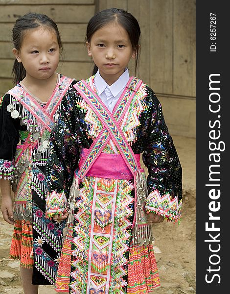 Laos Hmong girl in traditional clothes in the surroundings of Luang Prabang