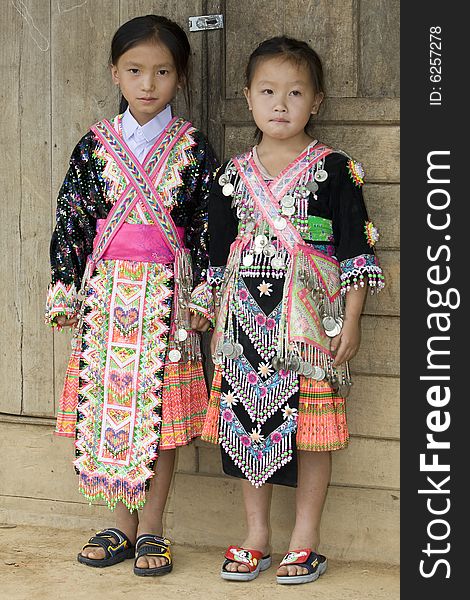 Laos Hmong girl in traditional clothes in the surroundings of Luang Prabang