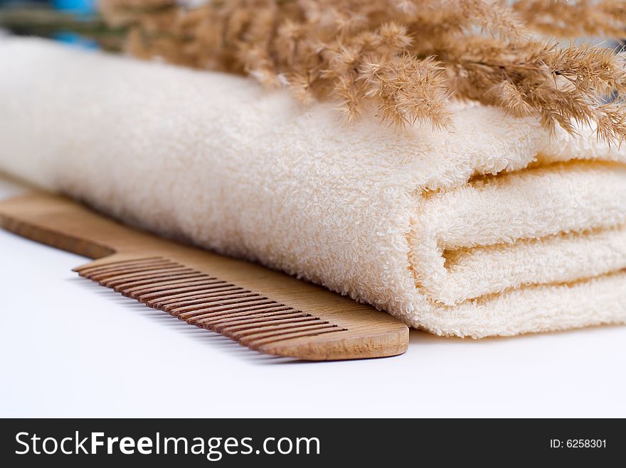 Bath background with towel, sponge and herb