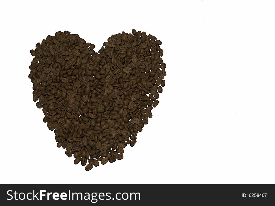 Heart from brown grains of coffee. Heart from brown grains of coffee