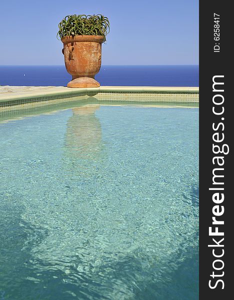 A beautiful pool at the edge of the Mediterranean to Spain