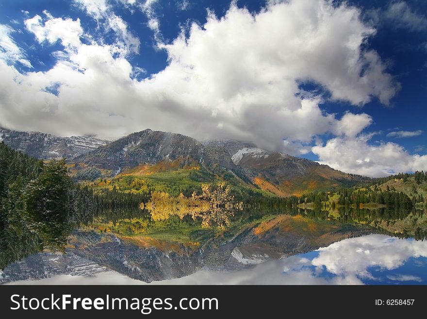 High mountain lake in the fall showing autumn colors reflected in the water
Americana. High mountain lake in the fall showing autumn colors reflected in the water
Americana