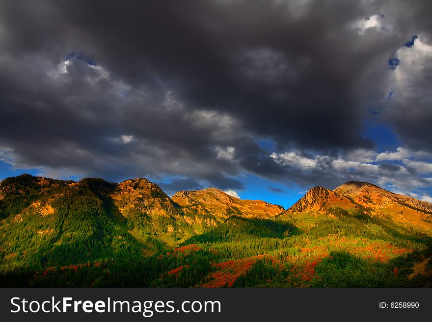 High Mountain Flat in the fall showing all the fall colors with mountains in the background. High Mountain Flat in the fall showing all the fall colors with mountains in the background