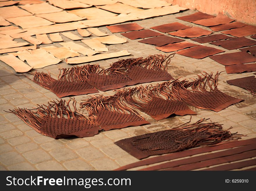 Leather drying on the floor in the souk in Marrakesh Morocco