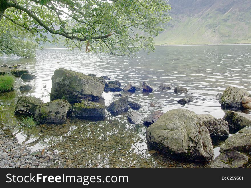 View across Crummock Water in the Lake District Cumbria ENGLAND. View across Crummock Water in the Lake District Cumbria ENGLAND