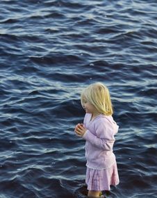 Girl In Pink Wading Stock Photos Girl In Pink Wading Stock Photos