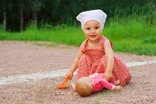 Small Girl Playing With A Doll Royalty Free Stock Images Small Girl Playing With A Doll Royalty Free Stock Images