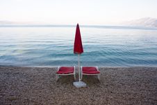 Chaises On The Empty Beach Stock Image Chaises On The Empty Beach Stock Image