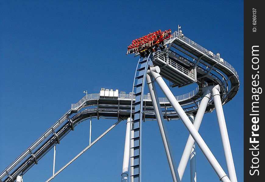 Blue Roller Coaster With People