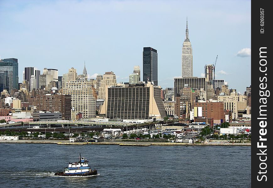 The boat sailing along Manhattan, New York City.