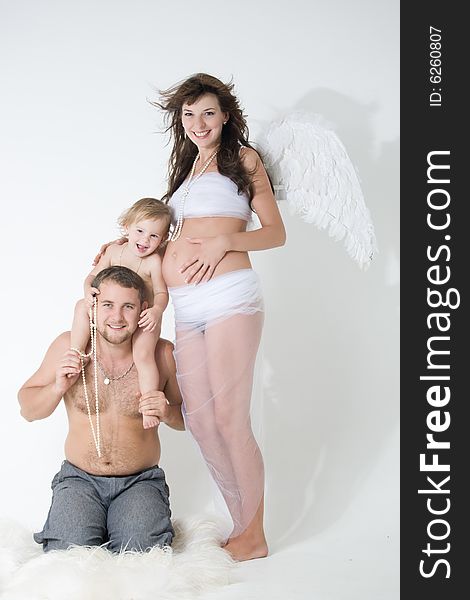 Father, daughter and mother with wings of angel. Father, daughter and mother with wings of angel