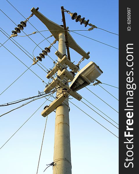 A dangerously manufactured electric pole with a street lamp. A dangerously manufactured electric pole with a street lamp.