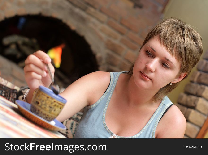 Girl In Tearoom