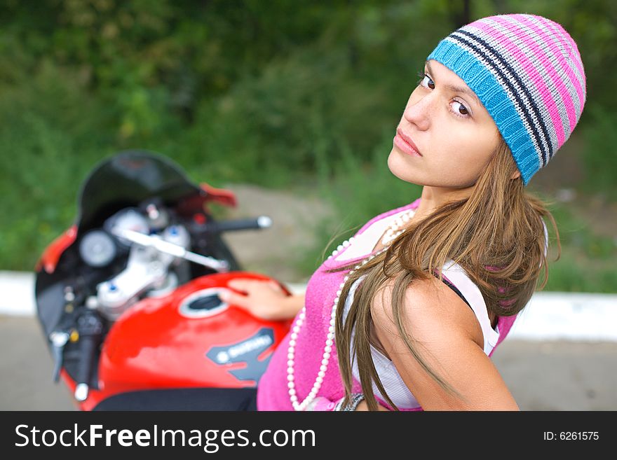 Closeup portrait of girl on bike in the nature. Closeup portrait of girl on bike in the nature