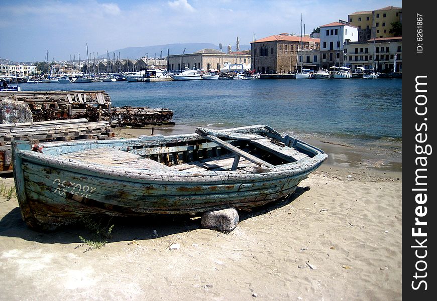 This is an old wooden boat at the old harbor in Chania, Crete. This is an old wooden boat at the old harbor in Chania, Crete.